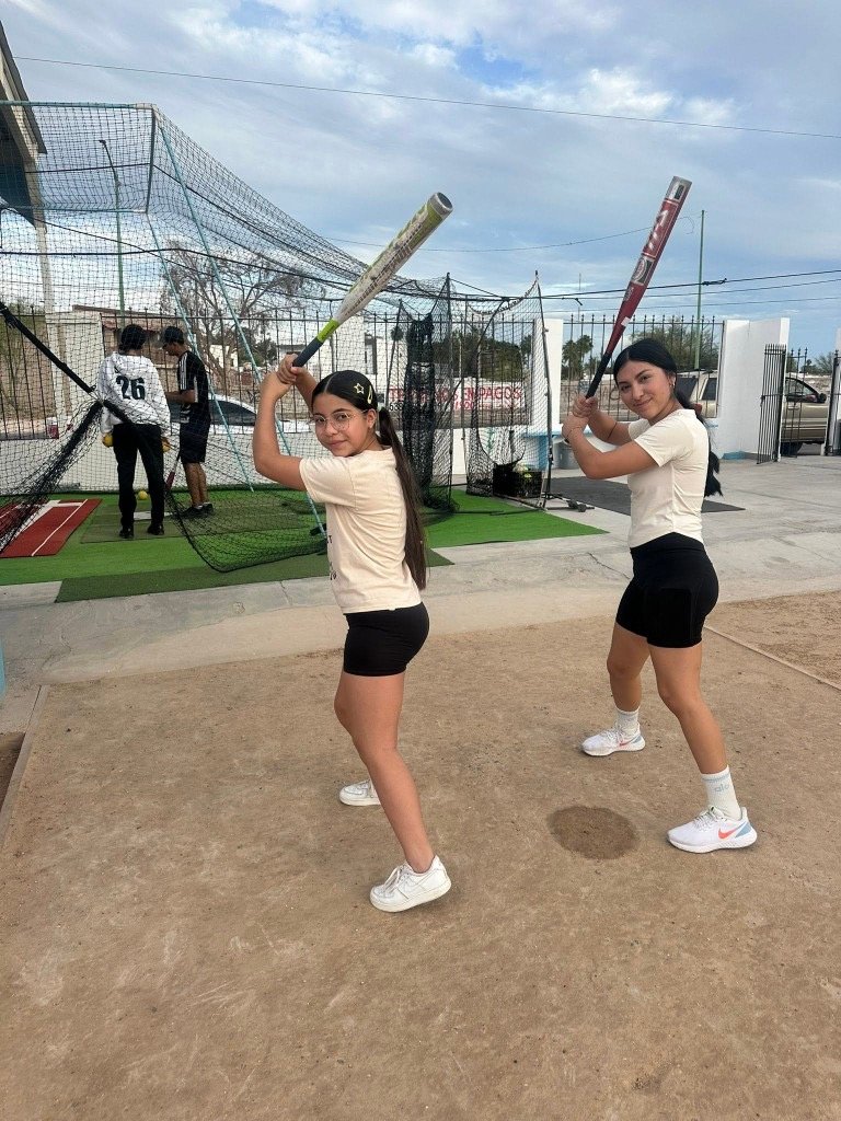 Youth practicing batting at the Oc3anView Ministry cage in Puerto Peñasco